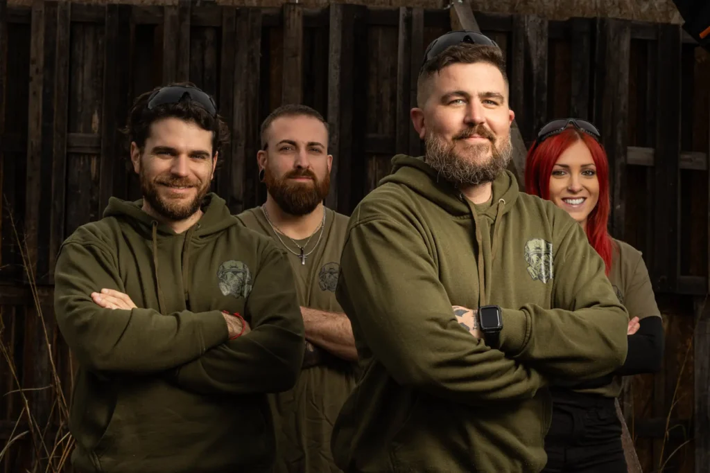 Retrato equipo de árbitros del campo de airsoft Elysium